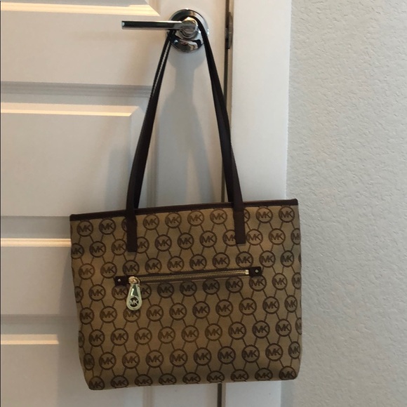 Michael Kors Handbags - Michael Kors MK purse handbag Used Good Condition
